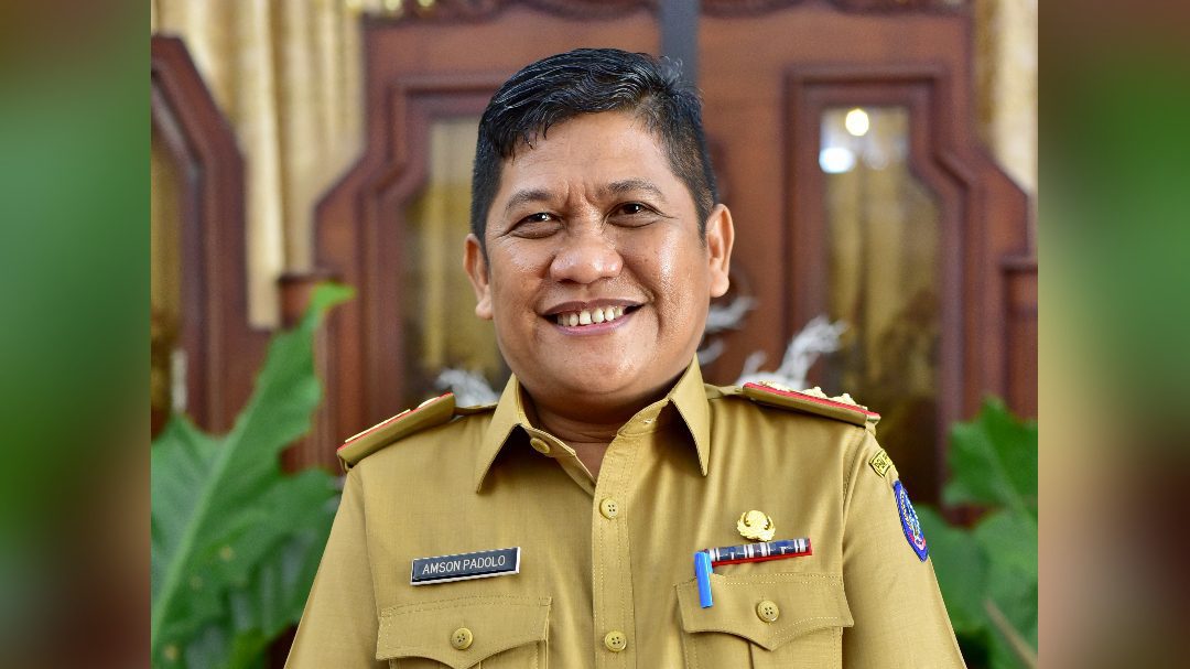 Dr. Amson Padolo, S.Sos., M.Si