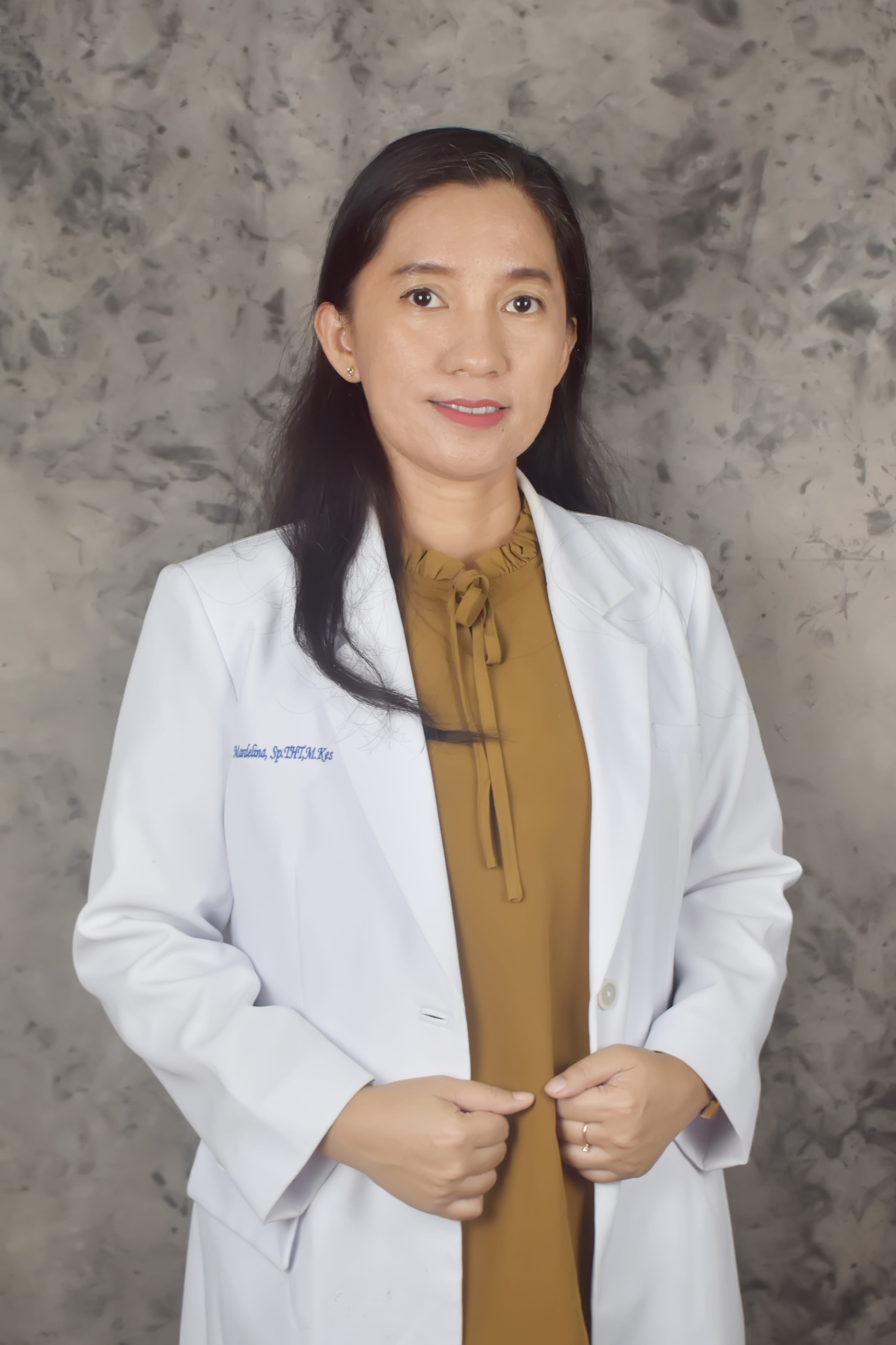 dr. Mardelina Palonda, Sp. THT-KL., M.Kes